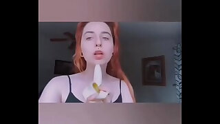 Girl sucking banana